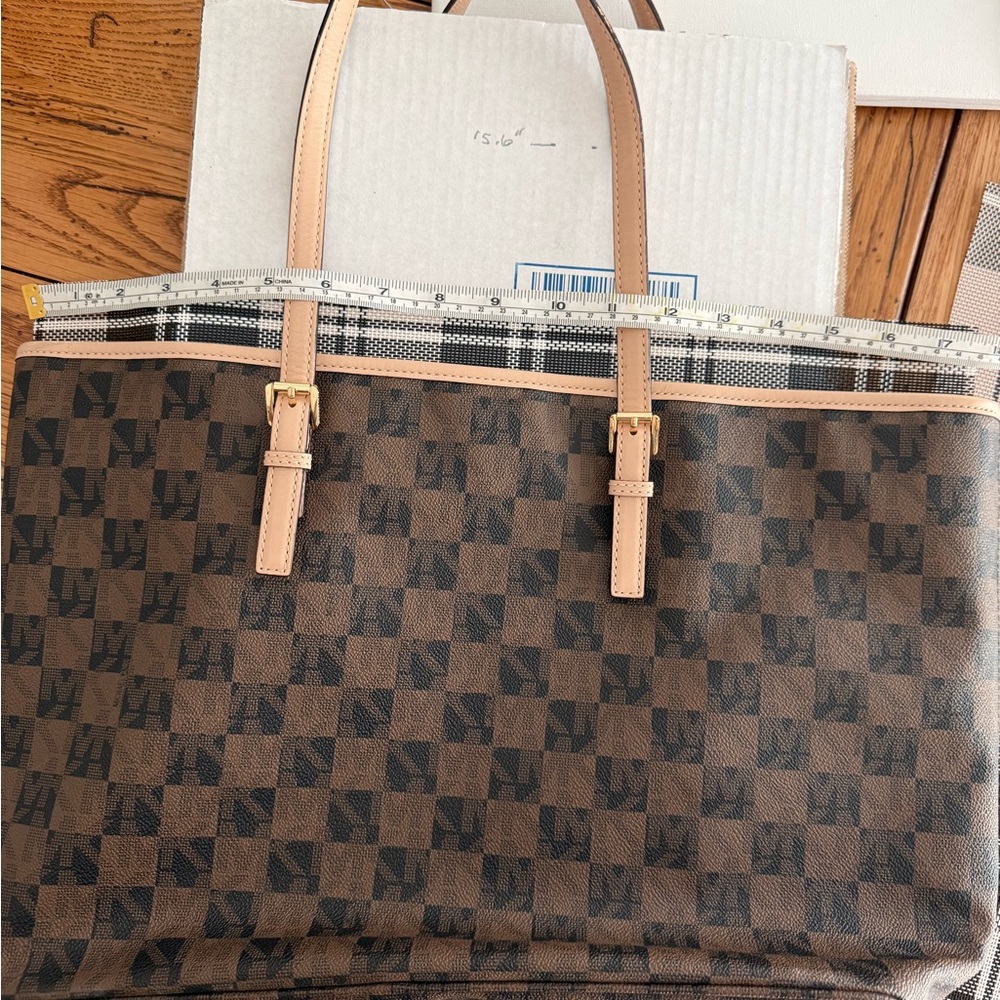 MICHAEL Michael Kors Jet Set travel tote in a brown checkered monogram pattern. - Picture 9 of 10